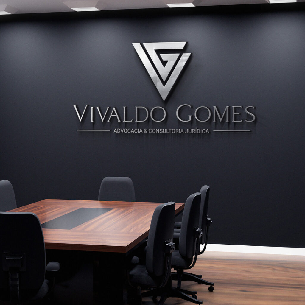 Imagem de escritório com a logomarca de Vivaldo Gomes ao fundo.